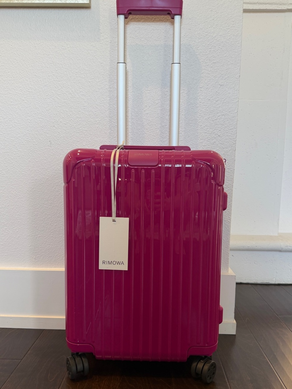 RIMOWA Carry-On Hard Shell Spinner in Bright Fuchsia Pink